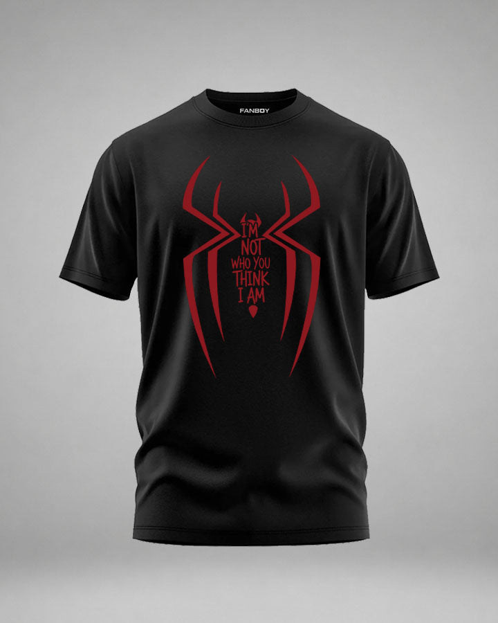 Shadow Web Graphic T-Shirt for Men in Black featuring "I'm Not Who You Think I Am" typography and bold red web-inspired design by Fanboy.in